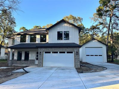 New construction Single-Family house 37 Timber Lane, Conroe, TX 77384 - photo 0