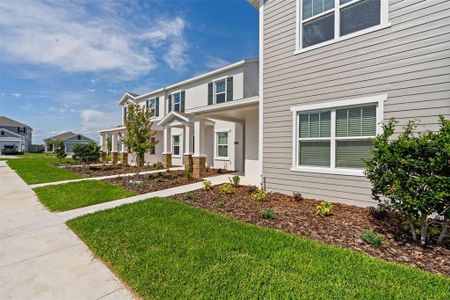 New construction Townhouse house 6068 Peaceful Parkway, Clermont, FL 34714 Wilshire- photo 0