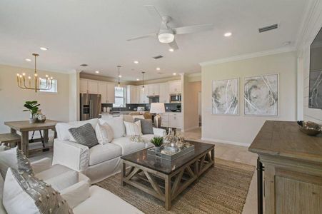 Photo of Pulte model home with same floor plan, not of actual home listed.