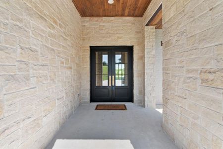 Doorway to property featuring french doors