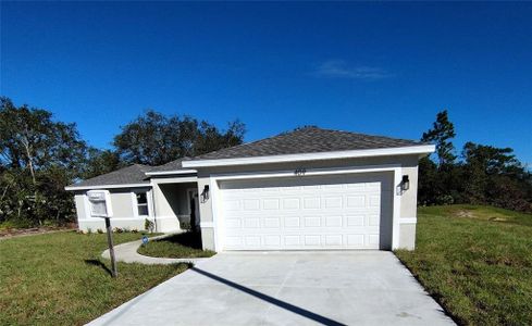 New construction Single-Family house 409 St Johns Lane, Poinciana, FL 34759 - photo 0