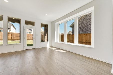 Unfurnished room with light hardwood / wood-style floors