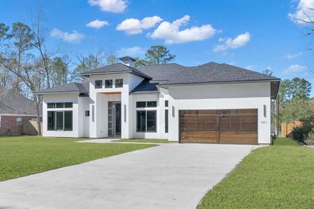 Stunning frameless glass garage door for modern elegance and natural light.