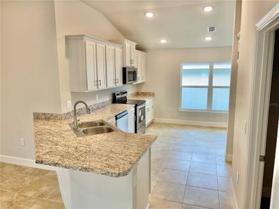 New construction Single-Family house 530 Tanaro Lane, Haines City, FL 33844 1820- photo 12 12