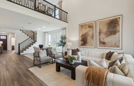 Spacious gathering room with two-story ceilings