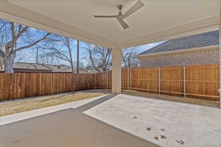 View of patio with ceiling fan