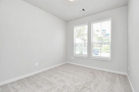 Another view of guest suite. Sample photo of completed home with similar floor plan. As-built interior colors and selections may vary