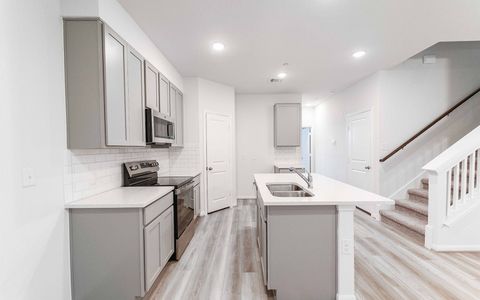 Municipal Drive Townhomes by CastleRock Communities in Leander - photo 5 5