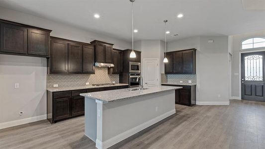 Kitchen - All Home and community information, including pricing, included features, terms, availability and amenities, are subject to change at any time without notice or obligation. All Drawings, pictures, photographs, video, square footages, floor plans, elevations, features, colors and sizes are approximate for illustration purposes only and will vary from the homes as built.