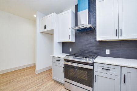 Built in Refrigerator space w/preplumbed ice maker connection. Sleek SS vent hood. Lot of storage options. Separate pantry closet.