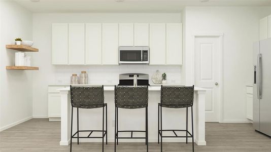 Kitchen with tasteful backsplash, stainless steel fridge with ice dispenser, light hardwood / wood-style floors, and white cabinets