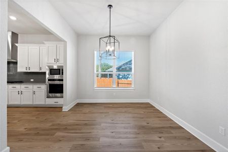 The dining area is open to both kitchen and entertaining areas, allowing a great flow from room to room.