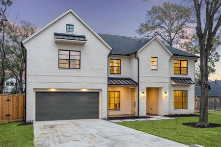 Stunning transitional style home with brick exterior