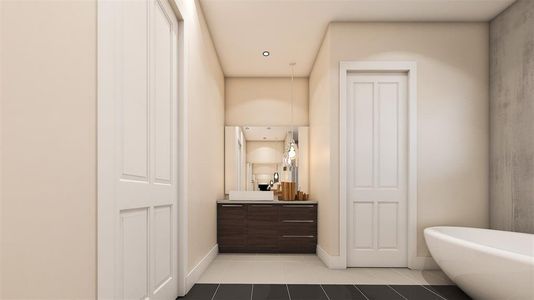 Bathroom with tile flooring, a bathing tub, and vanity