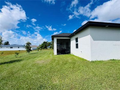 New construction Single-Family house 528 Jacaranda Pkwy E, Cape Coral, FL 33909 - image