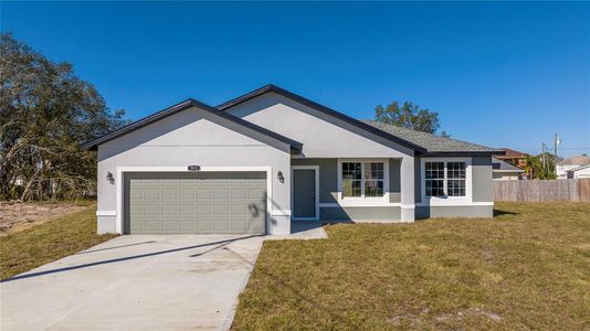 New construction Single-Family house 513 Curchill Place, Poinciana, FL 34759 - photo 0