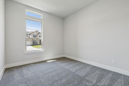 Spare room featuring carpet floors