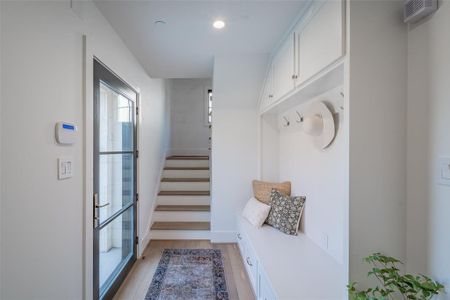 Mudroom featuring light wood-type flooring