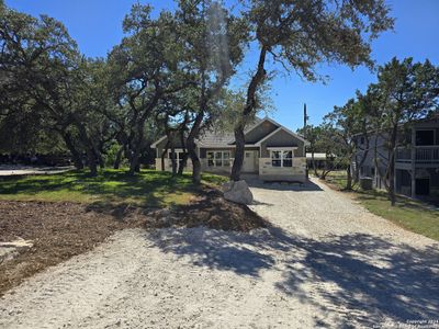 New construction Single-Family house 333 Oak Springs Drive, Canyon Lake, TX 78133 - photo 1 1