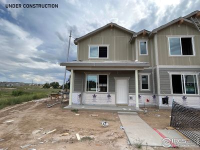 New construction Townhouse house 471 Condor Way, Johnstown, CO 80534 - photo 0