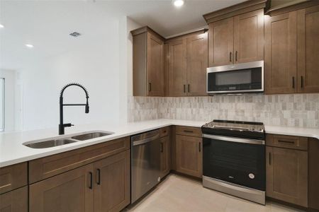 New construction Condo house 7557 Laureate Blvd, Unit 6301, Orlando, FL 32827 plan Aspen - image