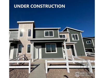 New construction Townhouse house 3704 Pinnacles Ct, Evans, CO 80620 - photo 0