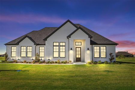 View of front of house featuring a lawn