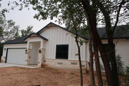 New construction Single-Family house 123 Waimanalo Dr, Bastrop, TX 78602 - photo 0