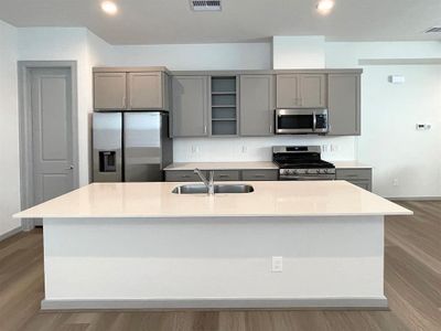 2nd Floor - Kitchen open to Living Room.