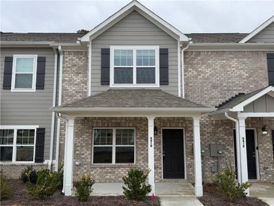 New construction Townhouse house 6410 Olmadison Pl, Atlanta, GA 30349 - photo 0