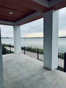 View of patio featuring a water view