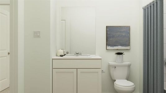 Bathroom with vanity and toilet