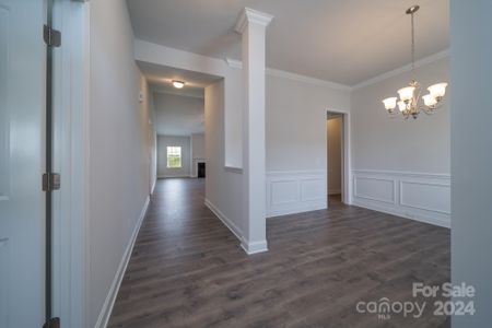 Foyer into Dining Room. Photo representation. Colors and options will differ