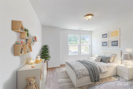 Secondary bedroom shown with virtual staging