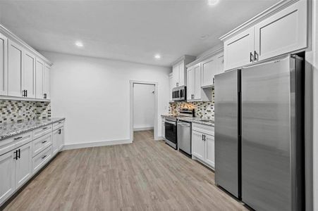 Galley style kitchen with plenty of counter space