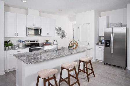 Kitchen of the Olympic plan modeled at Lakes at Bella Lago.