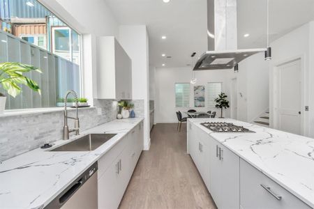 Expansive Kitchen Island Complete with a Built-In Microwave