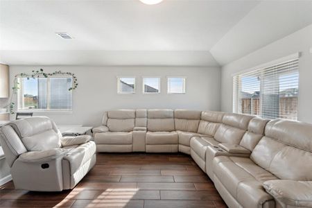 Living room featuring dark hardwood / wood-style flooring