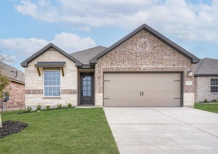 Exterior of the Fannin with stone and brick exteriors and a two-car garage.