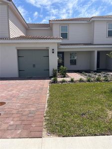 New construction Townhouse house 627 Bay Leaf Drive, Poinciana, FL 34759 - photo 0