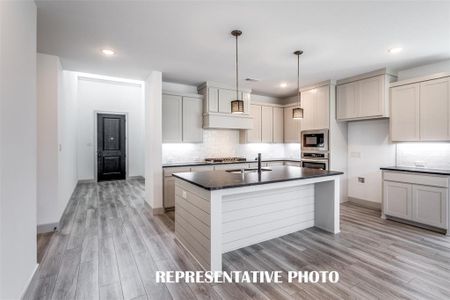 Style and sophistication abound in this dream kitchen!  REPRESENTATIVE PHOTO.