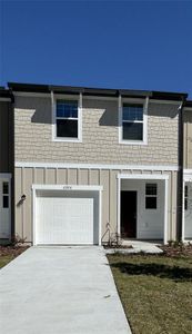 New construction Townhouse house 6211 Pina Colada Street, Zephyrhills, FL 33542 - photo 0