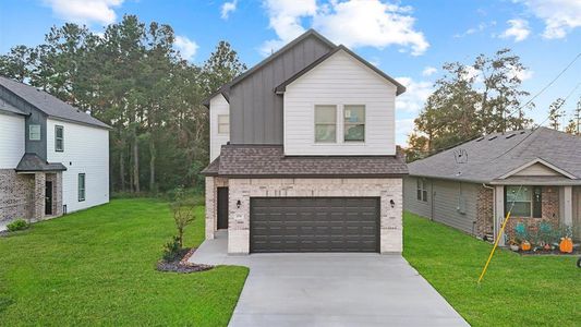 New construction Single-Family house 274 County Road 5102F, Cleveland, TX 77327 - photo 0