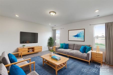 Family Room shown with virtual staging