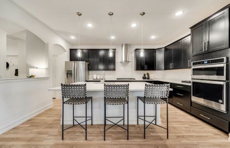 Spacious kitchen with eat-in bartop