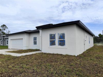 New construction Single-Family house 609 Amazon Place, Kissimmee, FL 34759 - photo 0