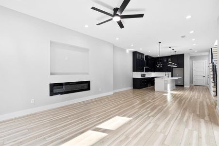 Living Room anchored by an Electric Fireplace!