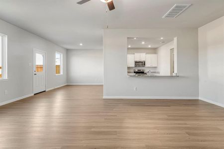 You will have the perfect view of your living room and TV from the kitchen, which is great for entertaining!