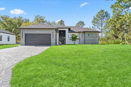 New construction Single-Family house 3013 14Th St W, Lehigh Acres, FL 33971 - image