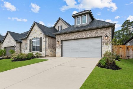 Another view of this home - TANDEM 3 CAR GARAGE too!!